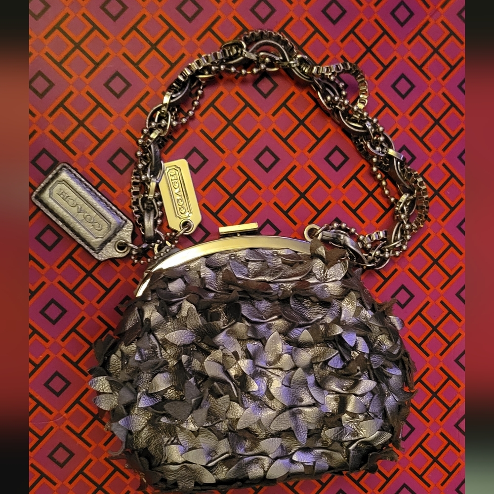 Coach leather gunmetal metallic dark silver pewter leather floral frame wristlet